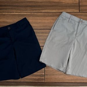 Bundle of underarmor shorts size 10. 1 navy and one gray.